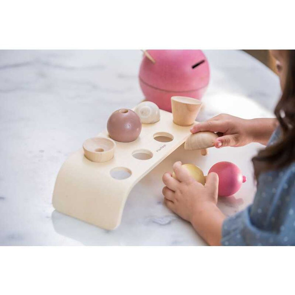 Kid playing PlanToys Ice Cream Set