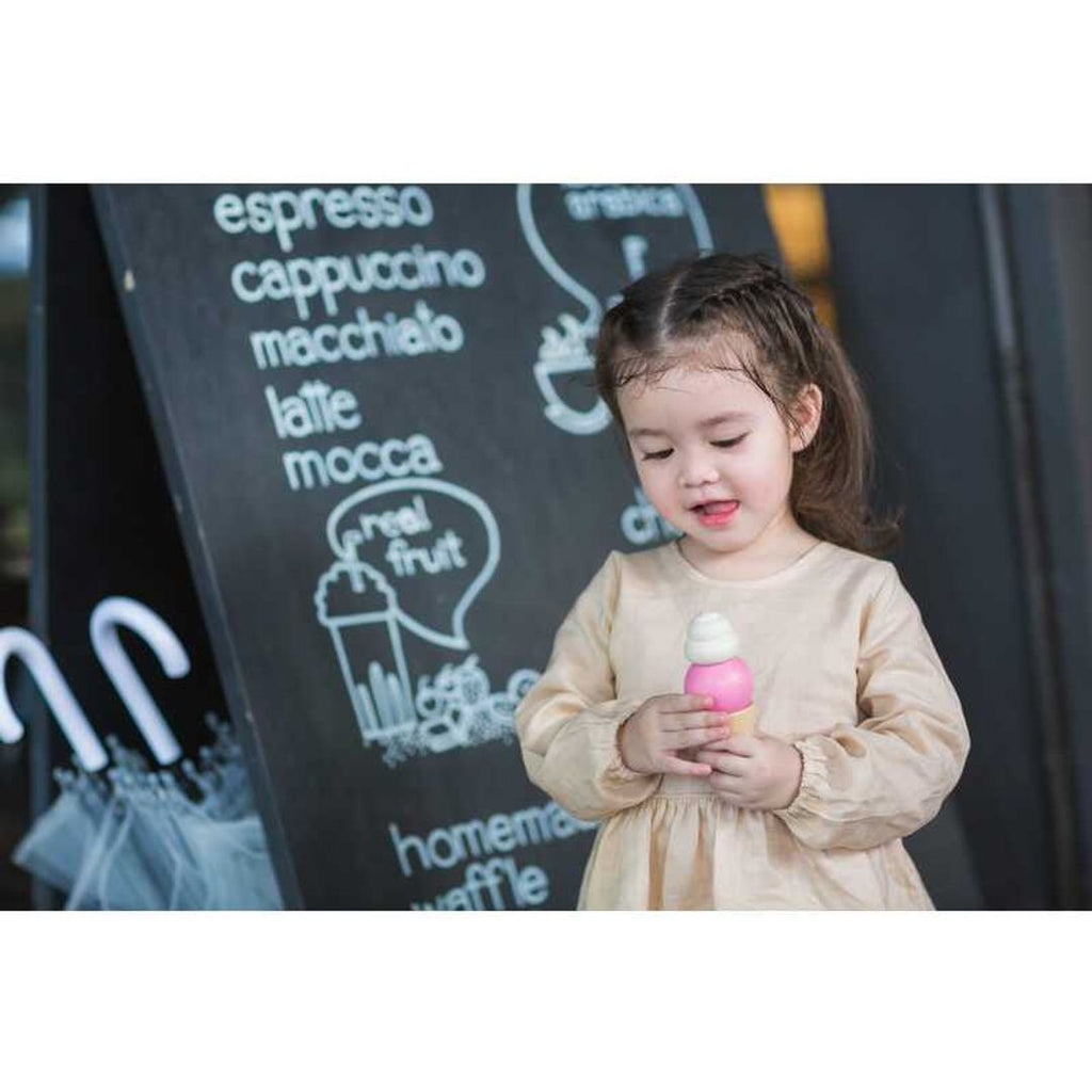 Kid playing PlanToys Ice Cream Set