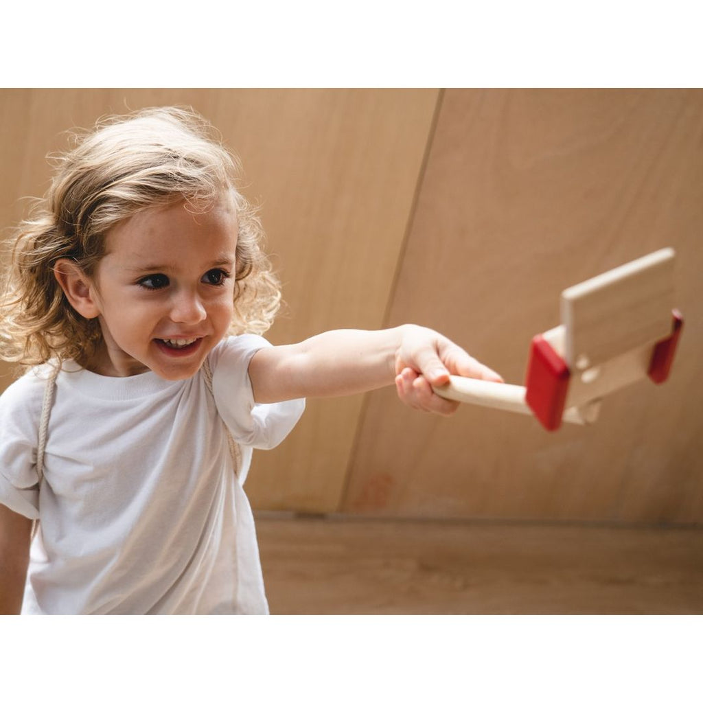 Kid playing PlanToys Vlogger Kit