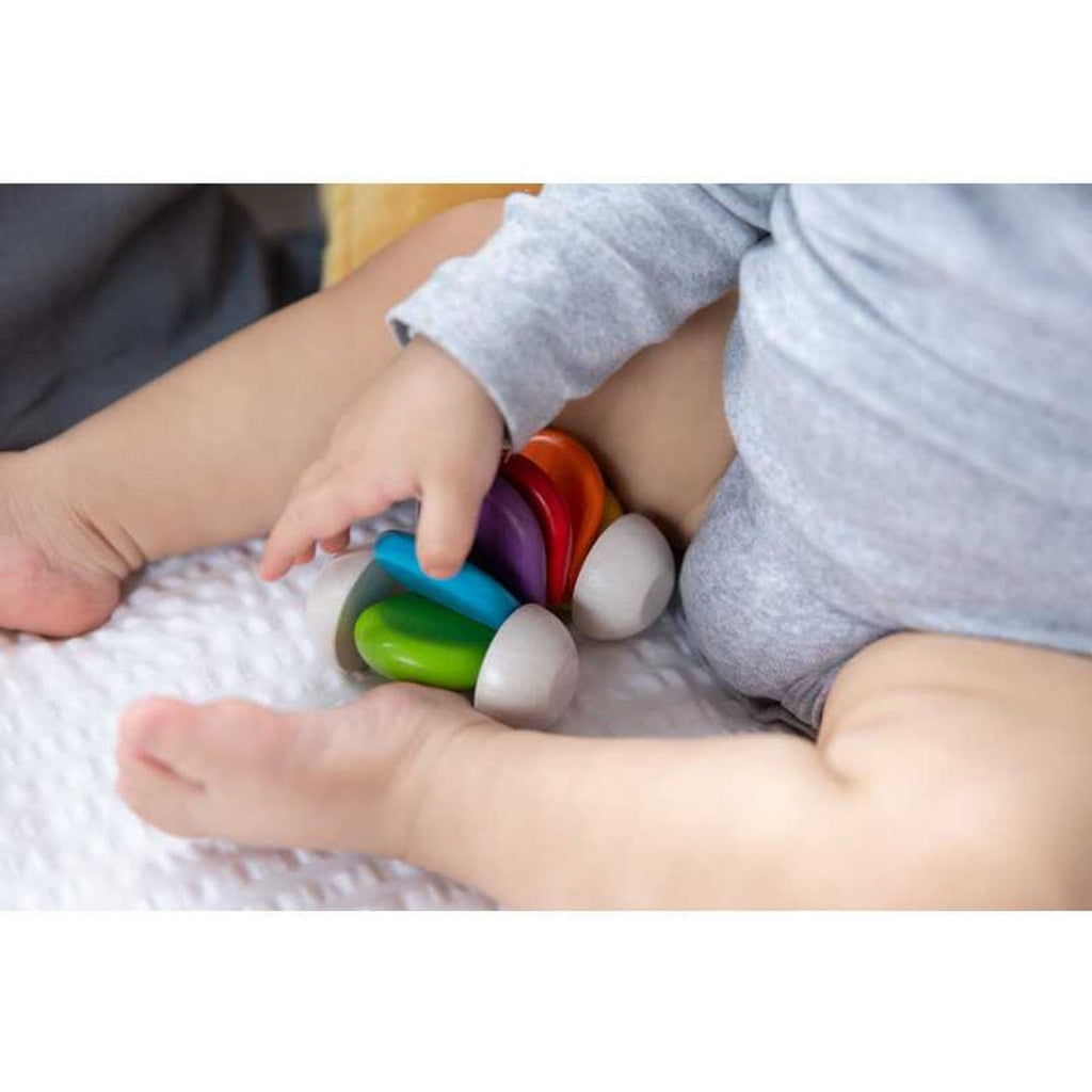 Kid playing PlanToys Baby Car