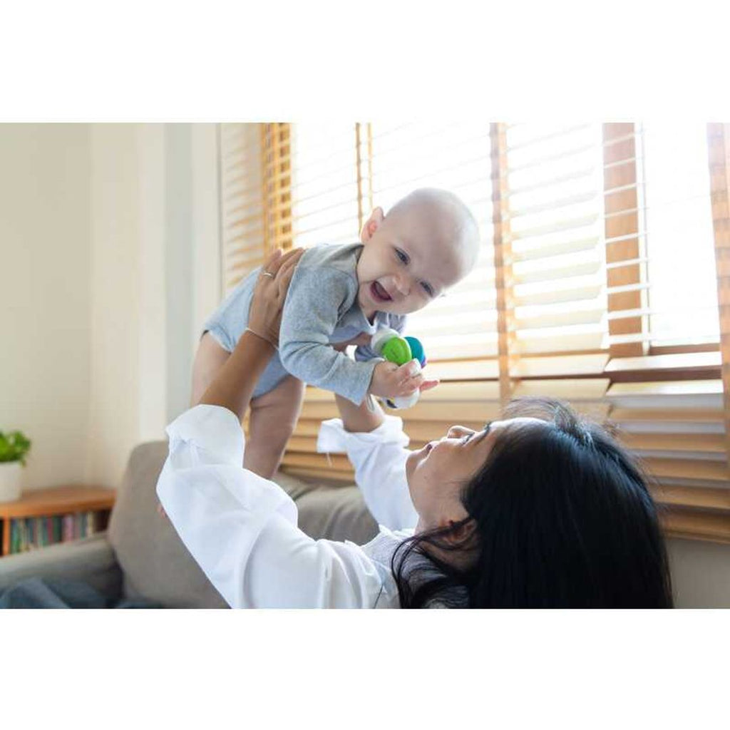 Kid playing PlanToys Baby Car