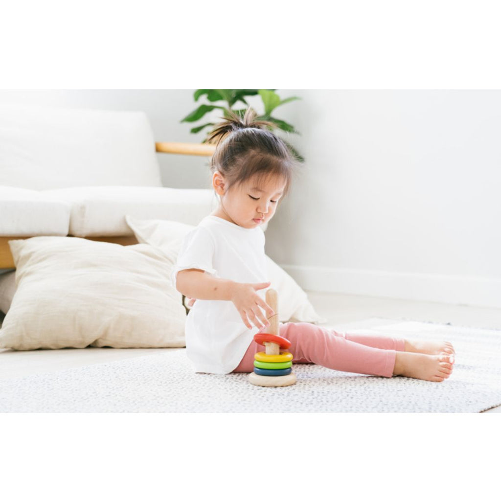 Kid playing PlanToys Twist & Sort