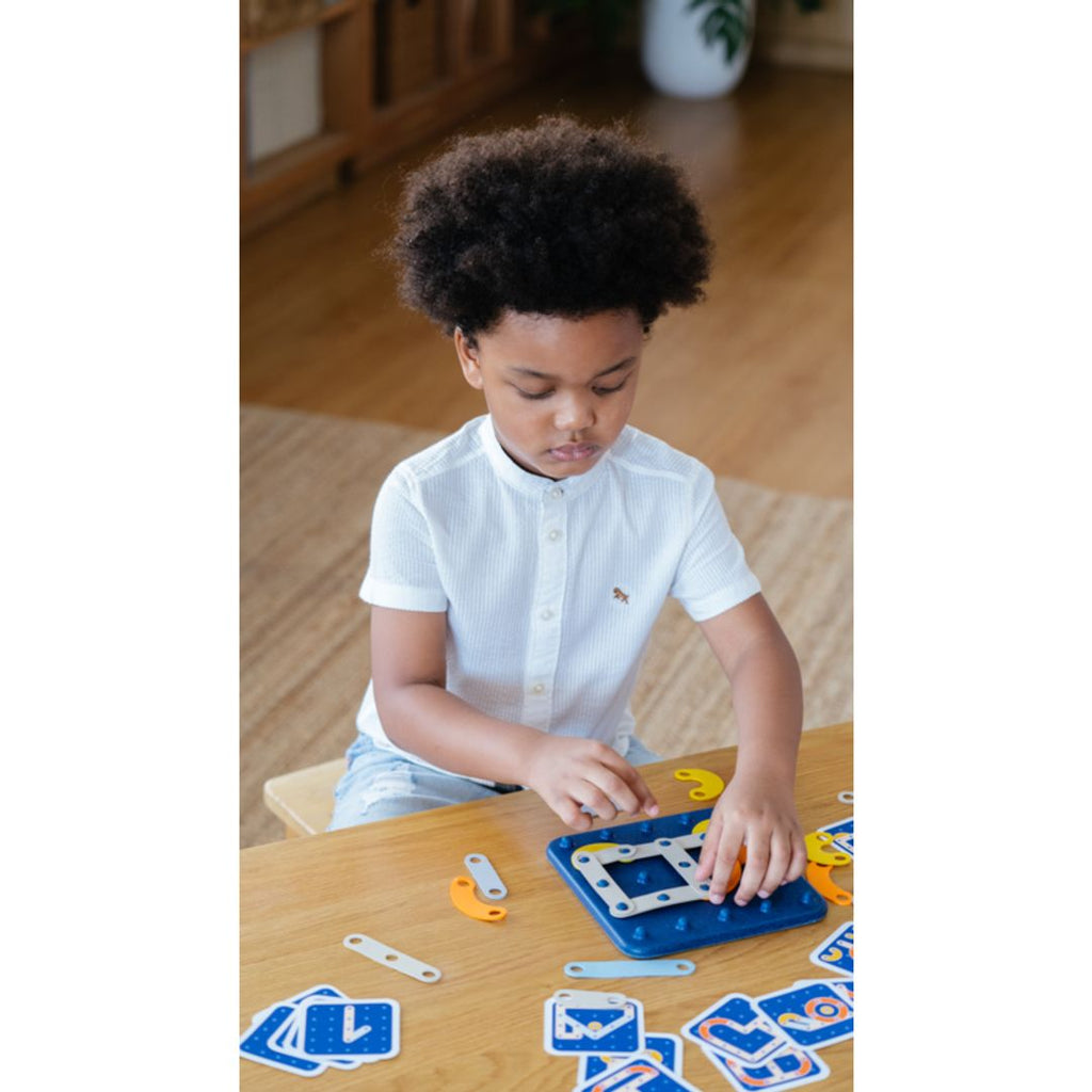 Kid playing PlanToys Creative Board