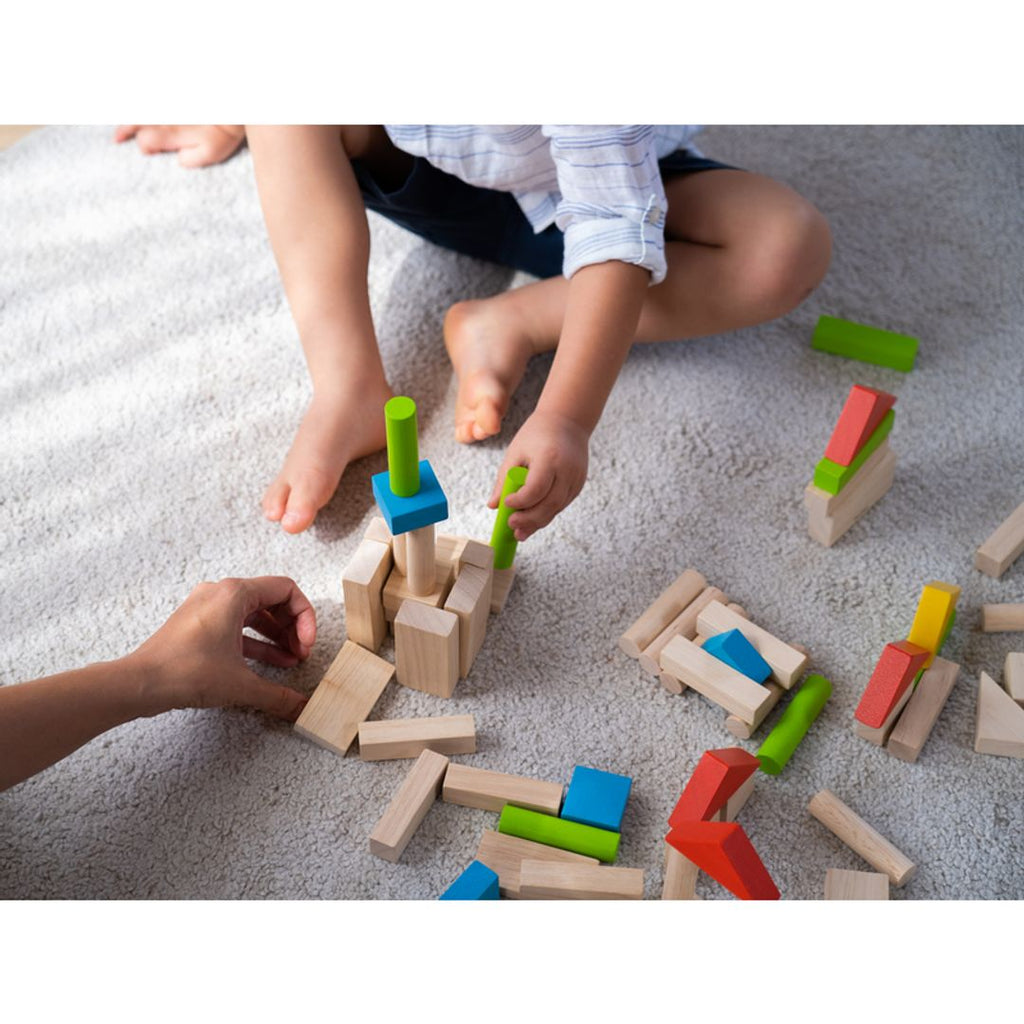 Kid playing PlanToys Colorful 40 Unit Blocks