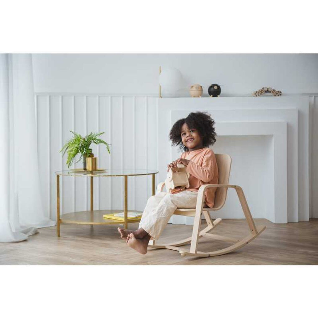 Kid using PlanToys Rocking Chair