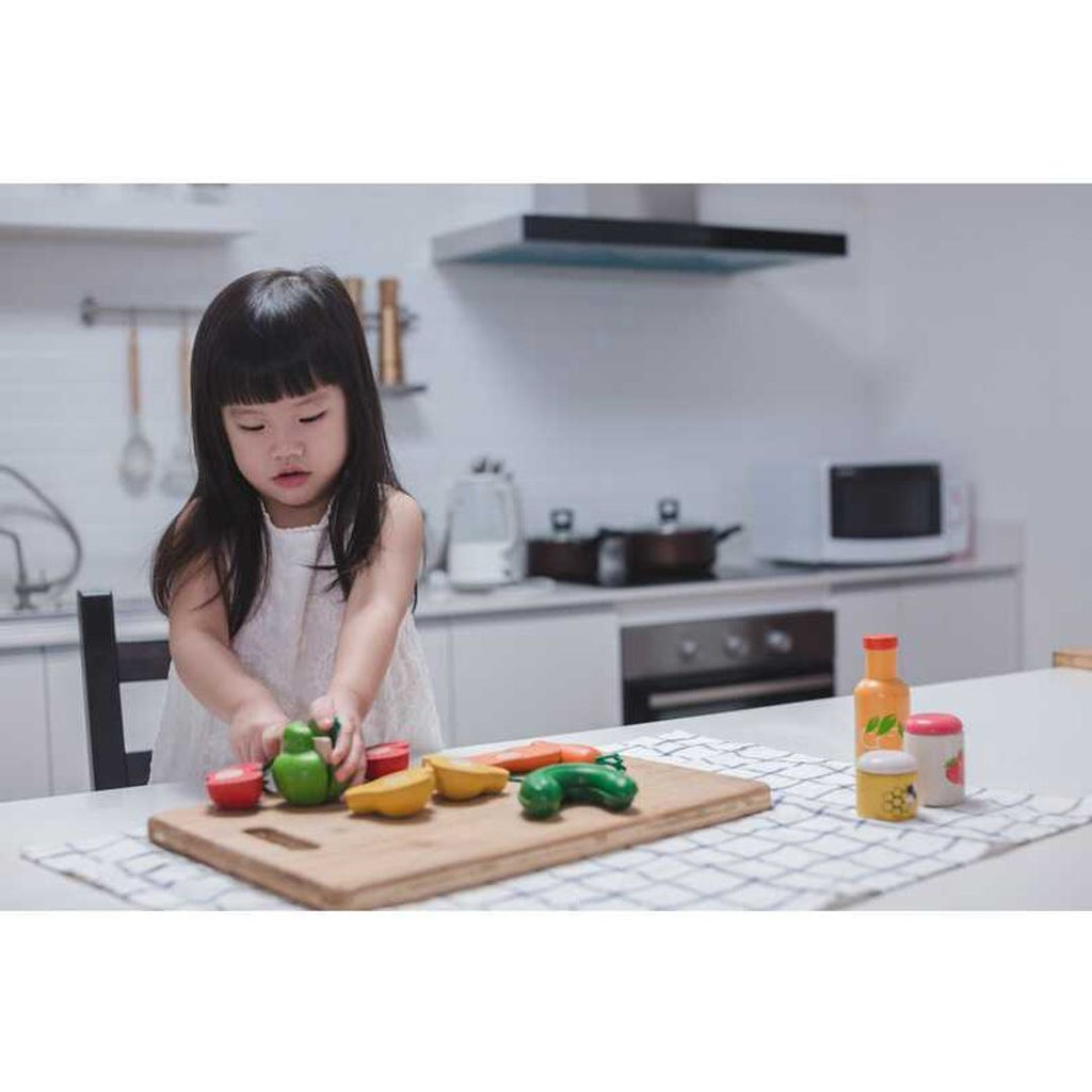 Kid playing PlanToys Food & Beverage Set