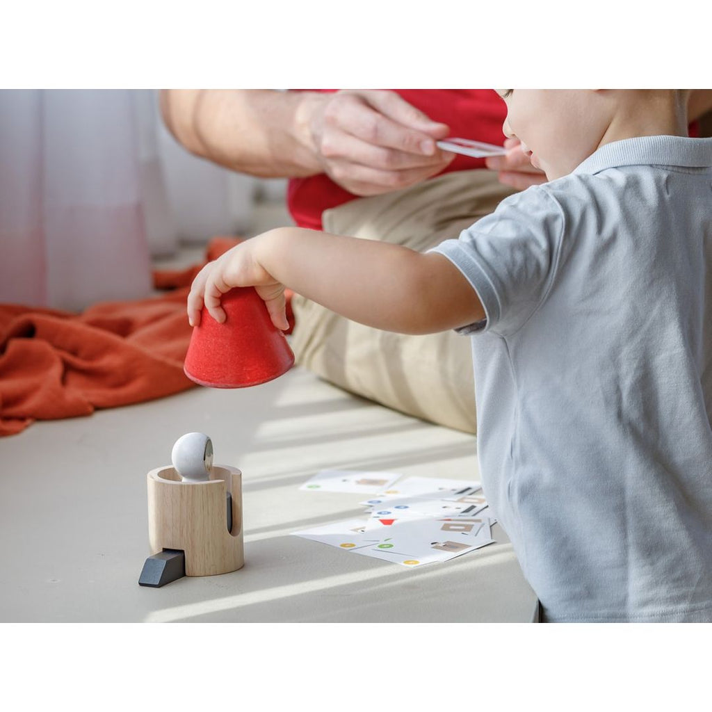 Kid playing PlanToys Spatial Rocket