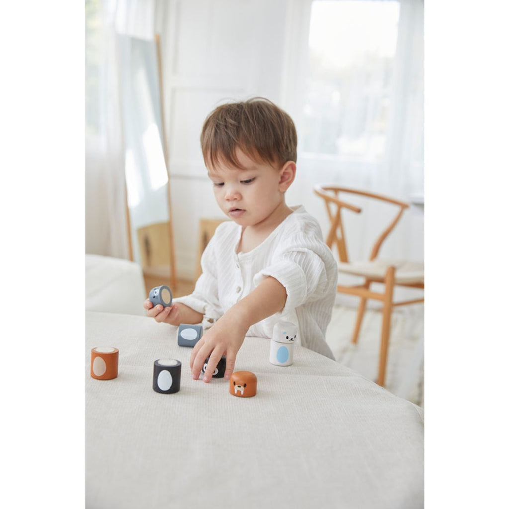 Kid playing PlanToys Arctic Animal Matching