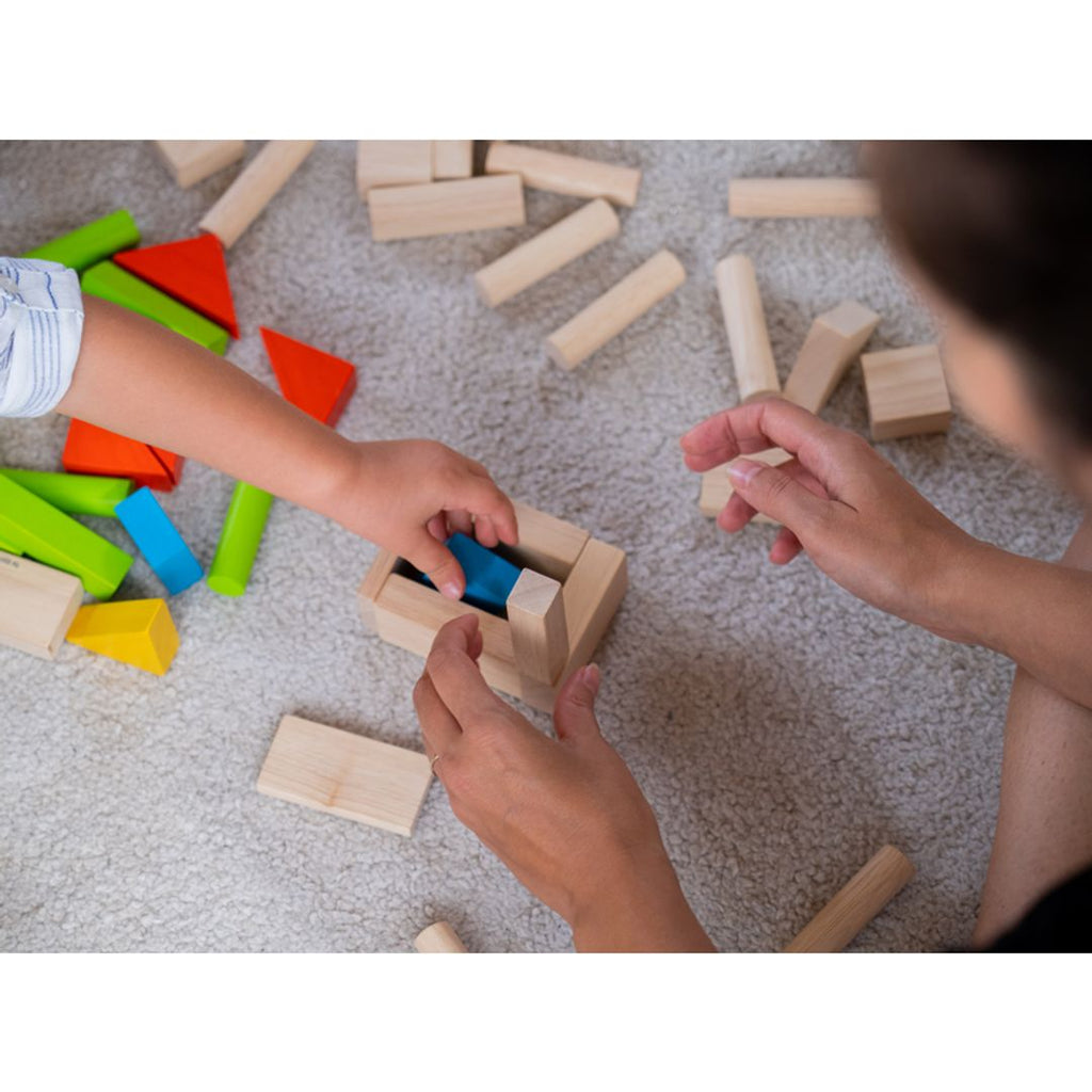 Kid playing PlanToys Colorful 40 Unit Blocks