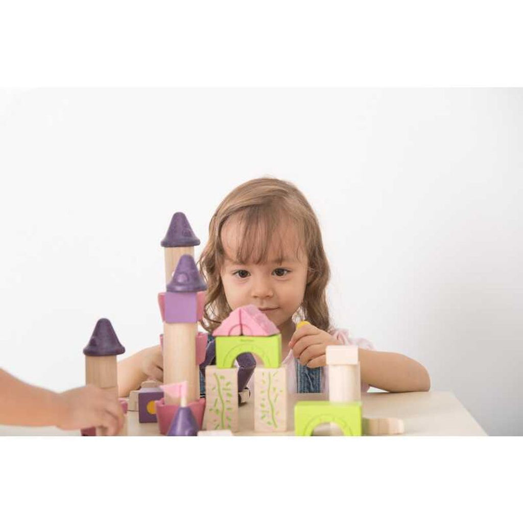 Kid playing PlanToys Fairy Tale Blocks